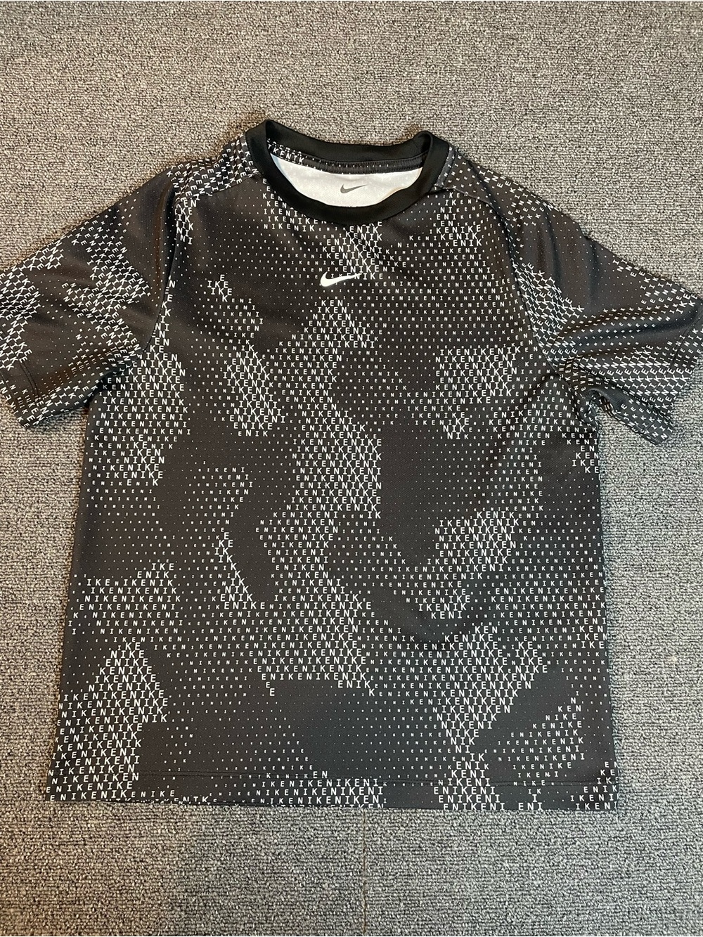 Nike Dri-FIT All-Over Wordmark Graphic Athletic Youth T-Shirt – Large